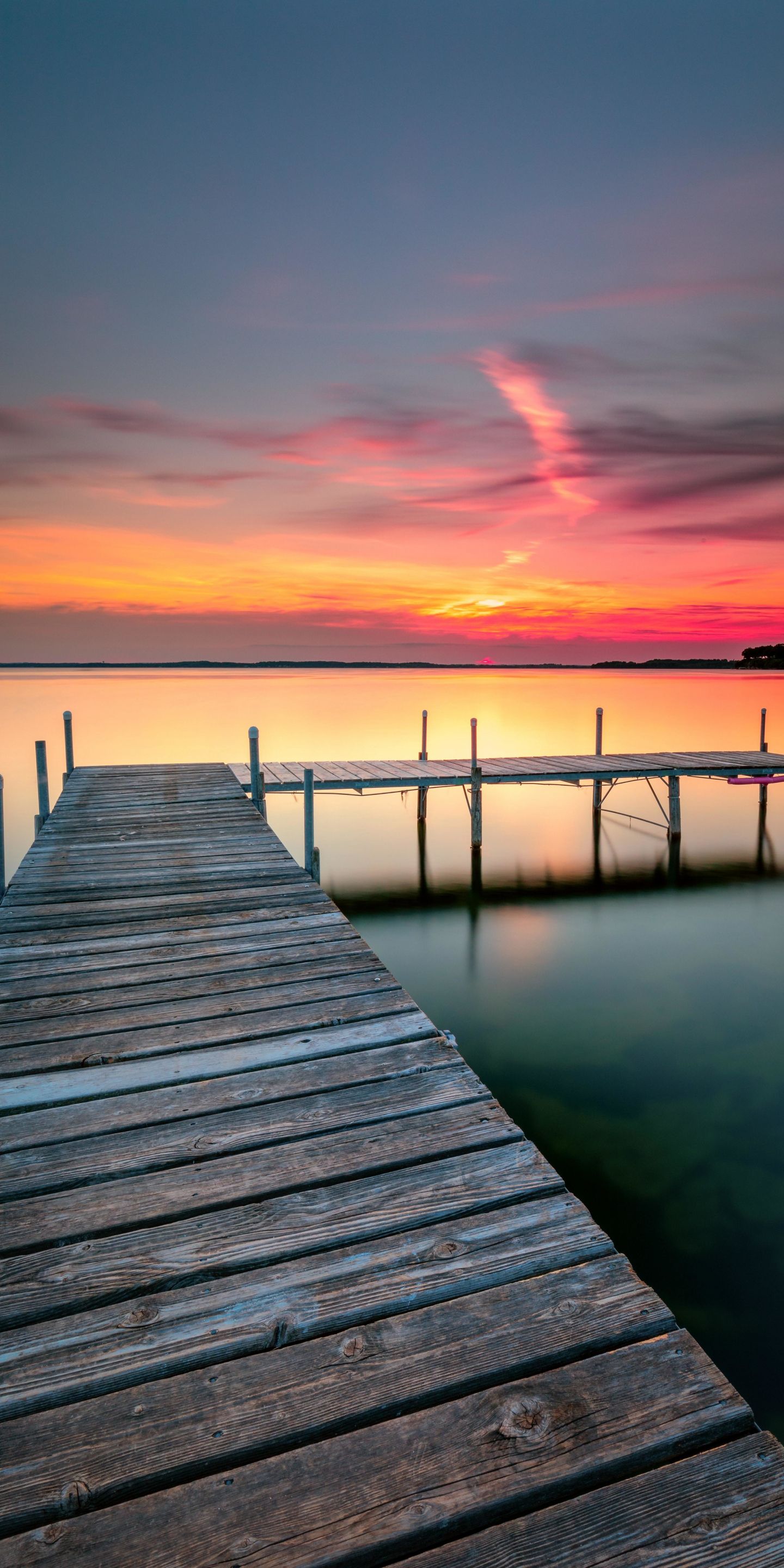 A Calm Lake At Sunset Wallpapers