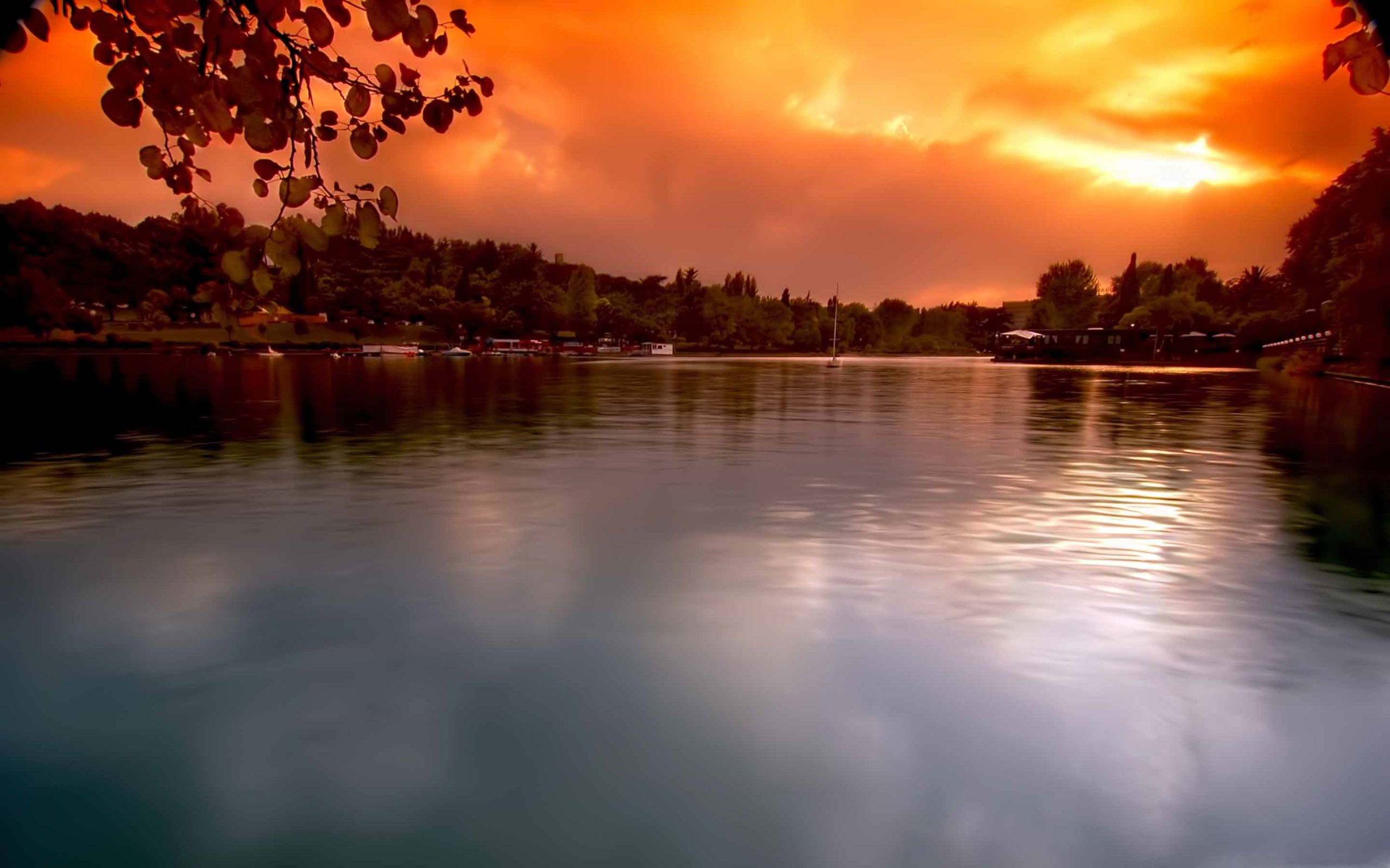 A Calm Lake At Sunset Wallpapers