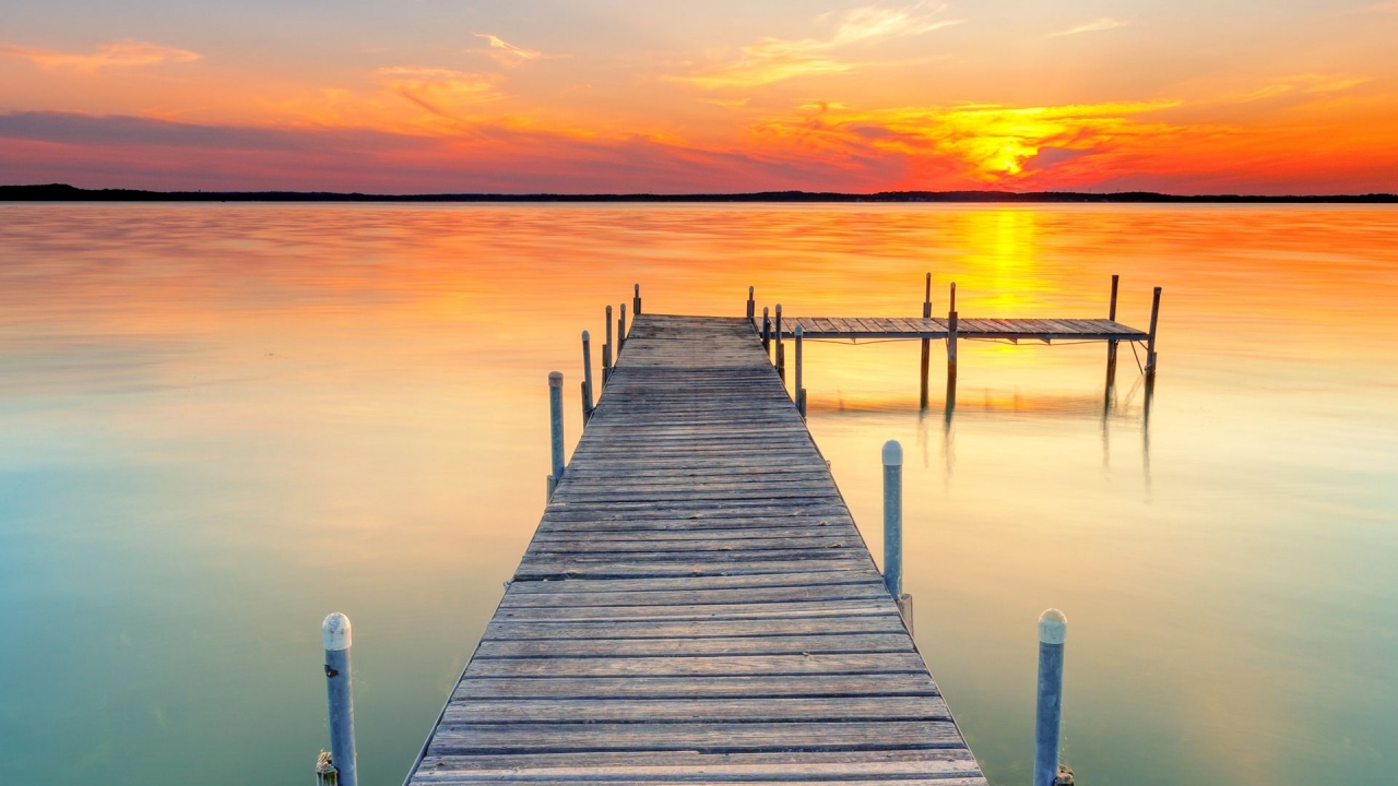 A Calm Lake At Sunset Wallpapers