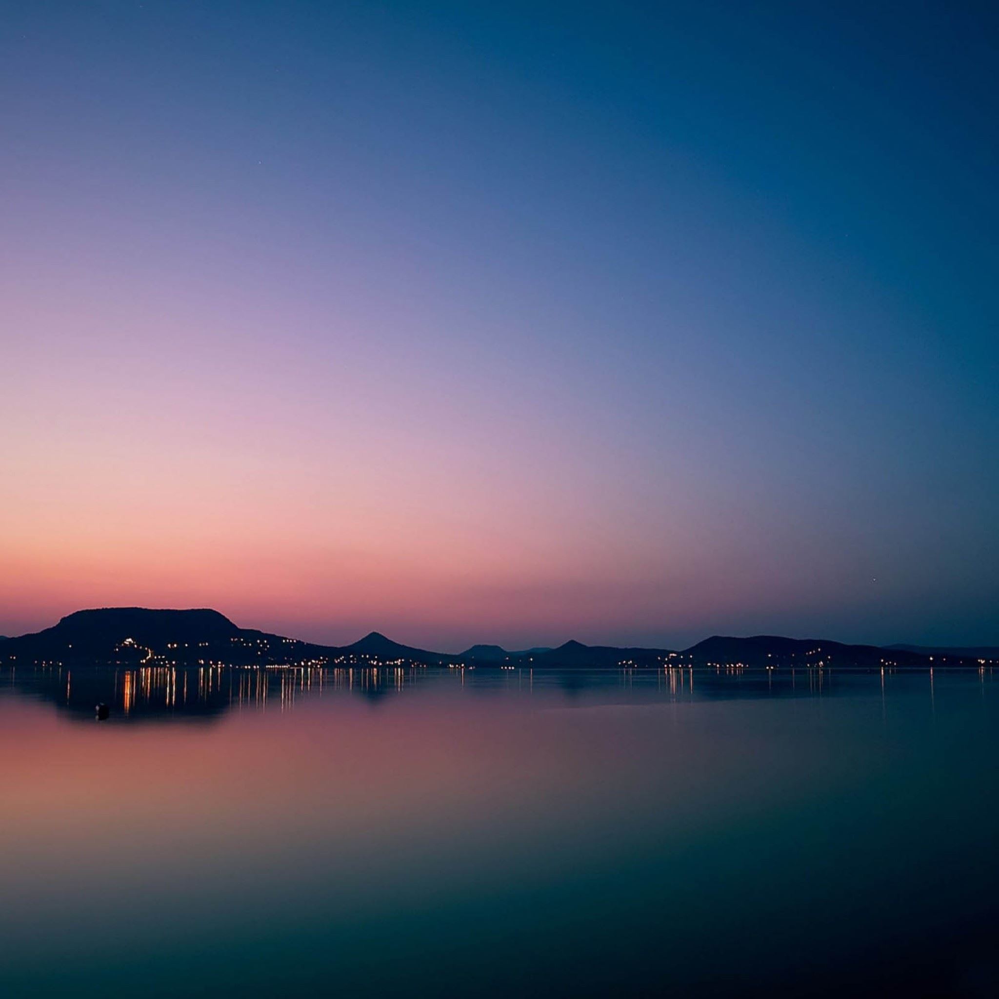 A Calm Lake At Sunset Wallpapers