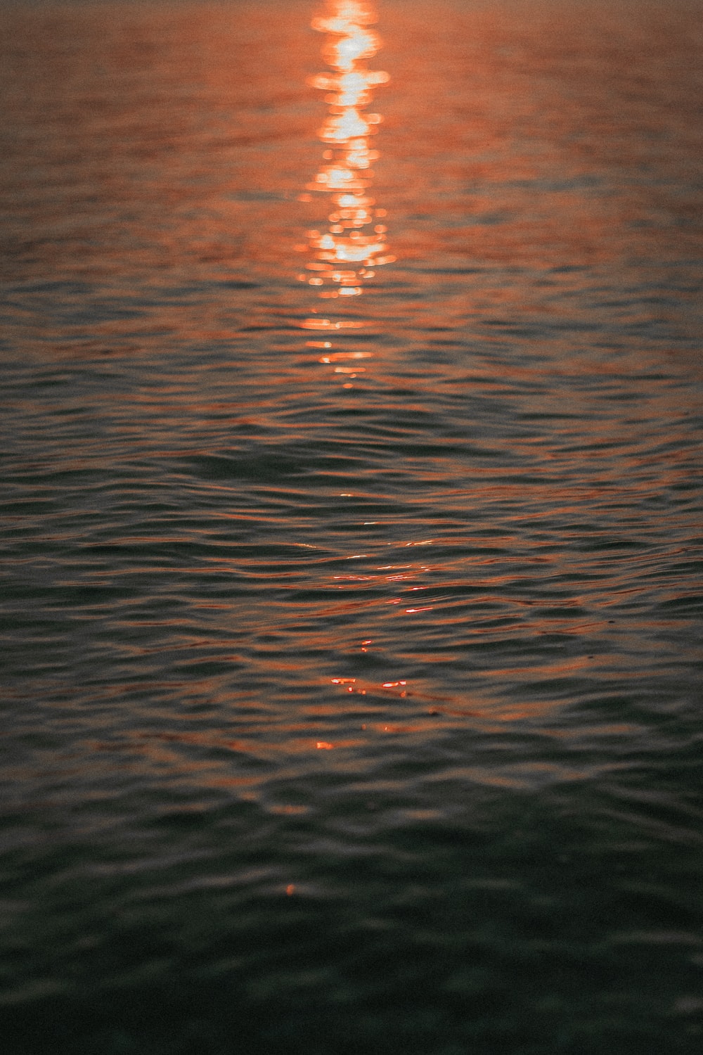 A Calm Lake At Sunset Wallpapers