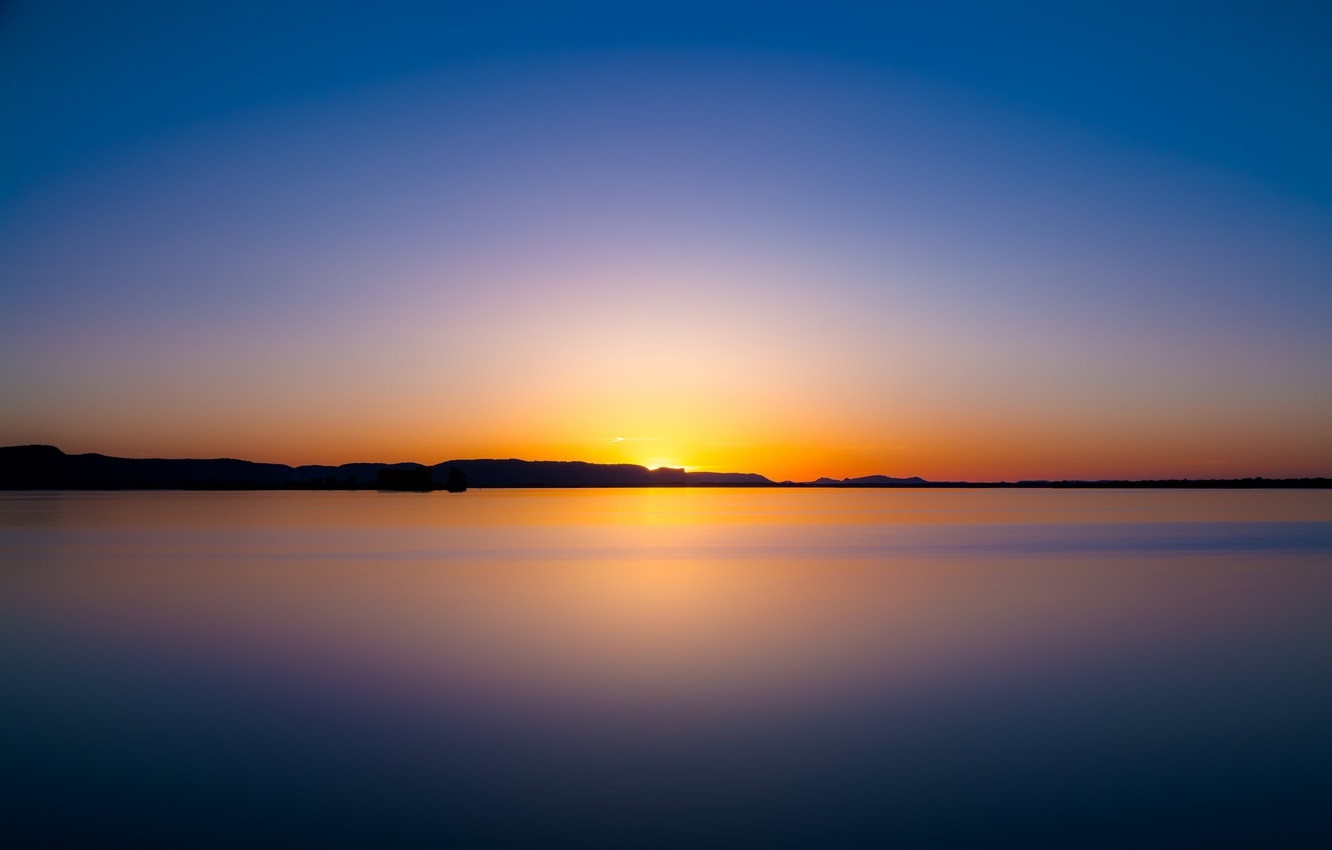 A Calm Lake At Sunset Wallpapers