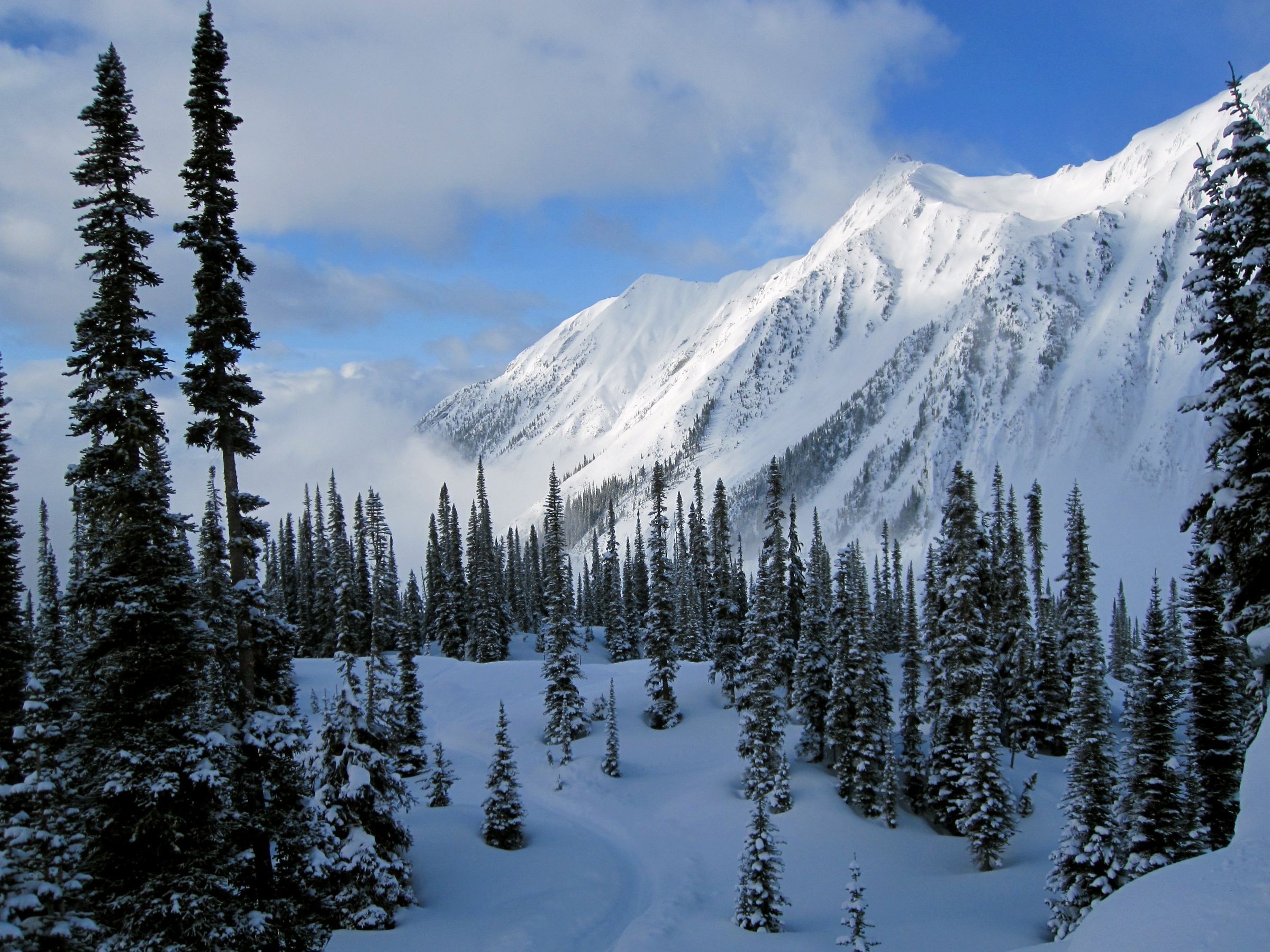 A Mountain Covered In Snow Wallpapers