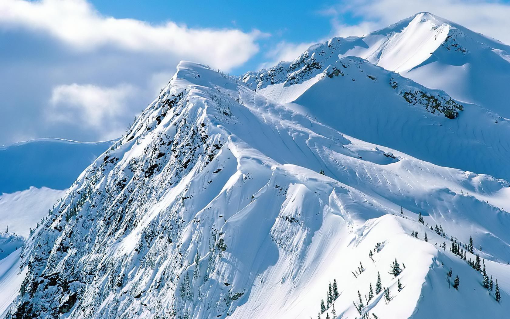 A Mountain Covered In Snow Wallpapers