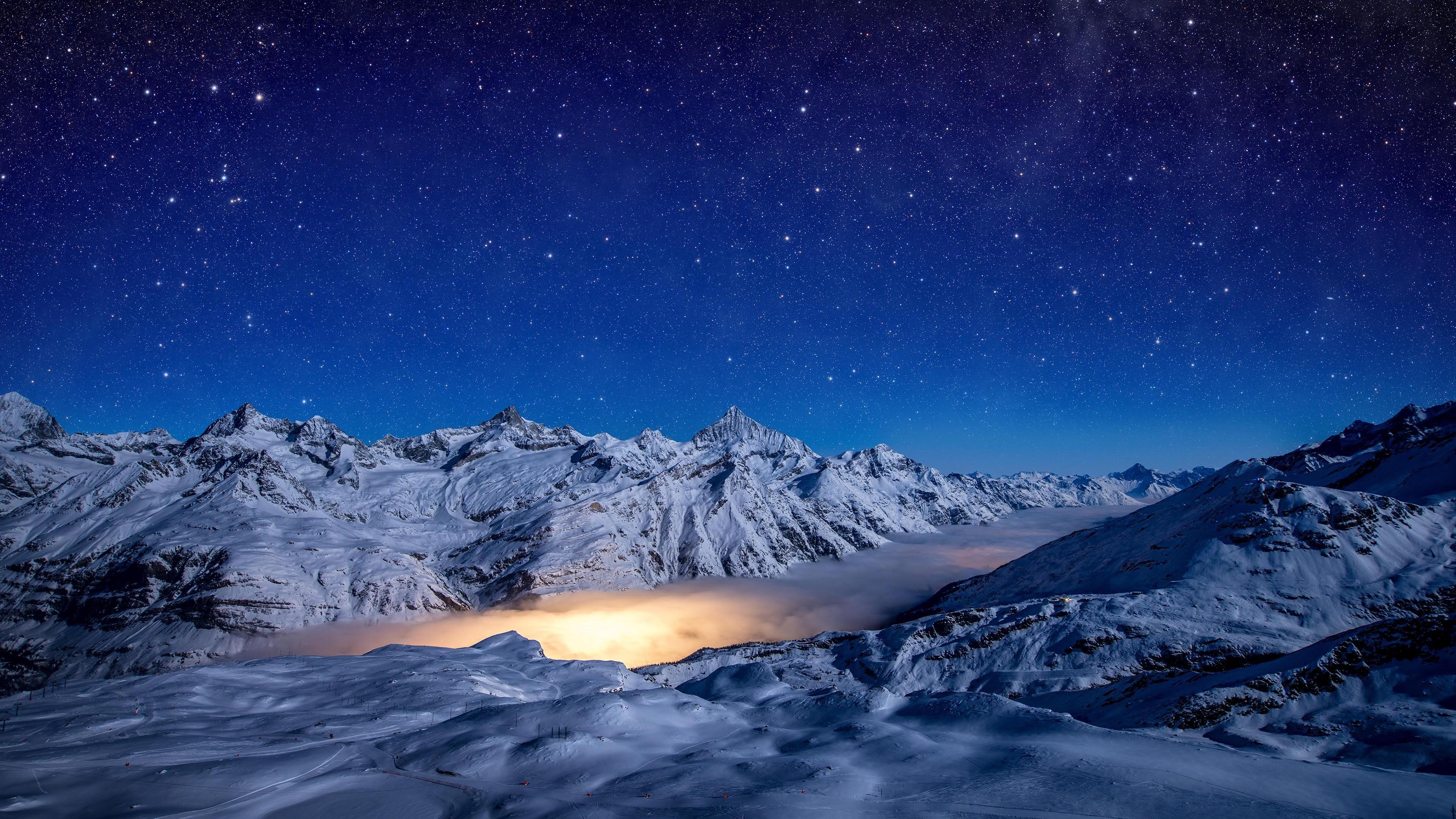 A Mountain Covered In Snow Wallpapers