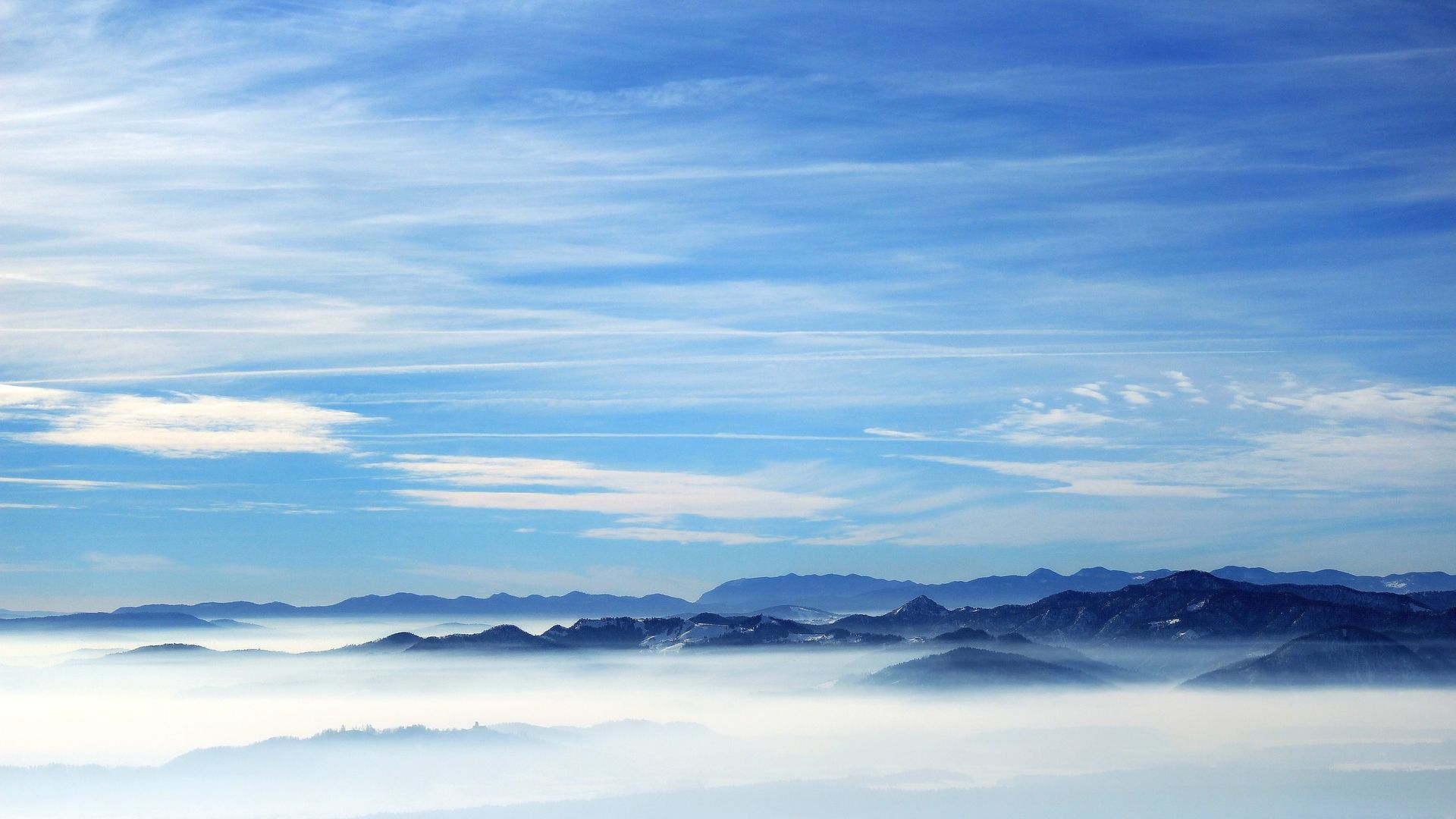 Fog Covering Horizon Mountains Under Blue Sky Wallpapers
