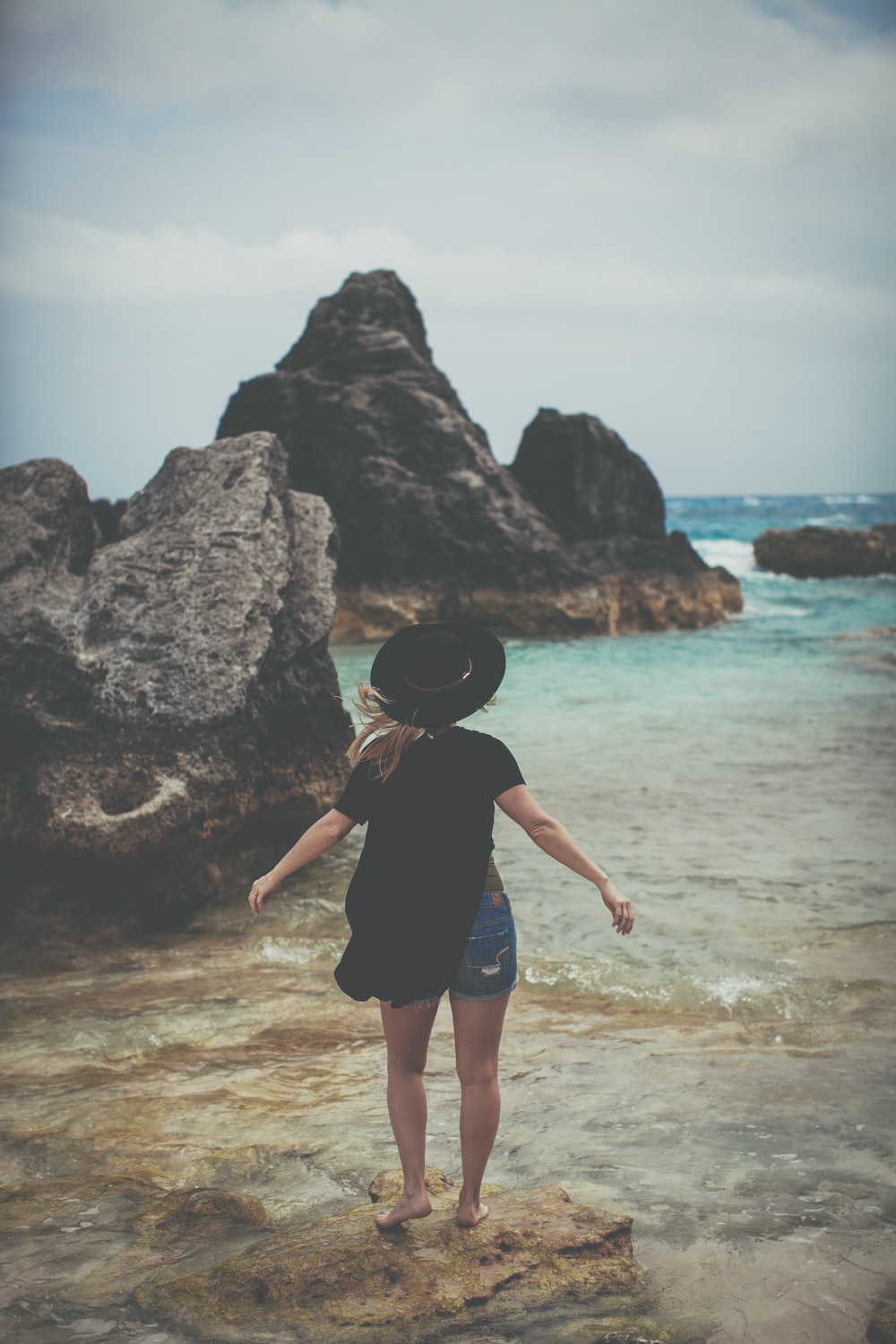 Girl Standing Over Rock Wallpapers