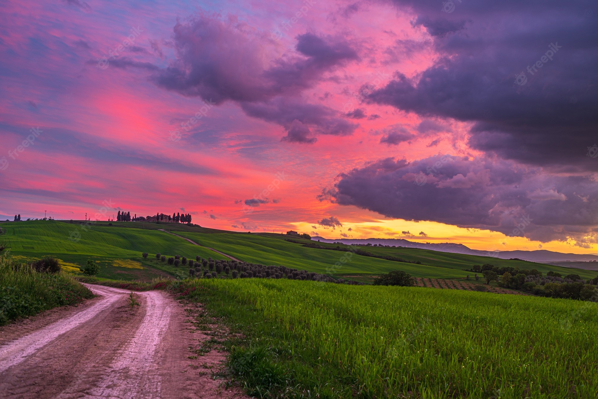 Green Grass And Fogg Under Purple Sky During Sunset Wallpapers