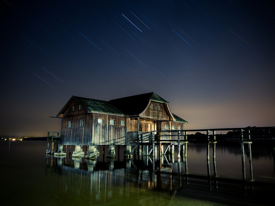 Houses At Lake Water Starry Night Wallpapers