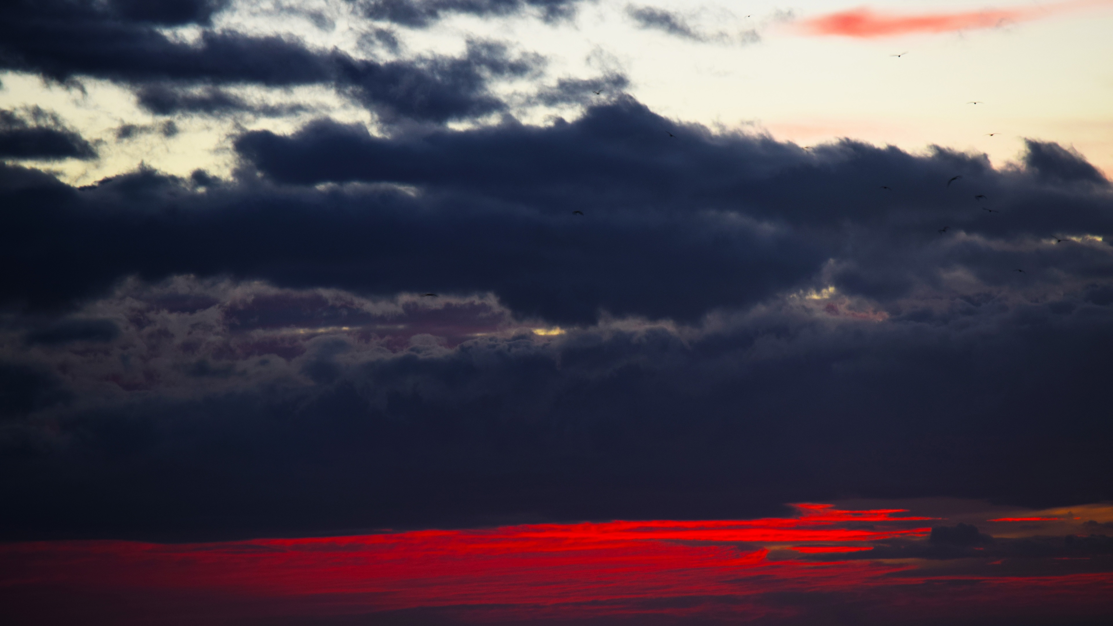 Red Sunset And Dark Clouds Wallpapers