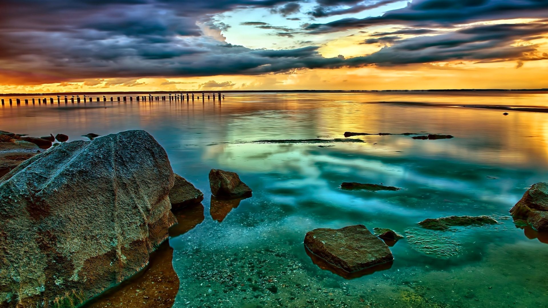 Reflection Of Cloudy Sunset Over Beach Wallpapers