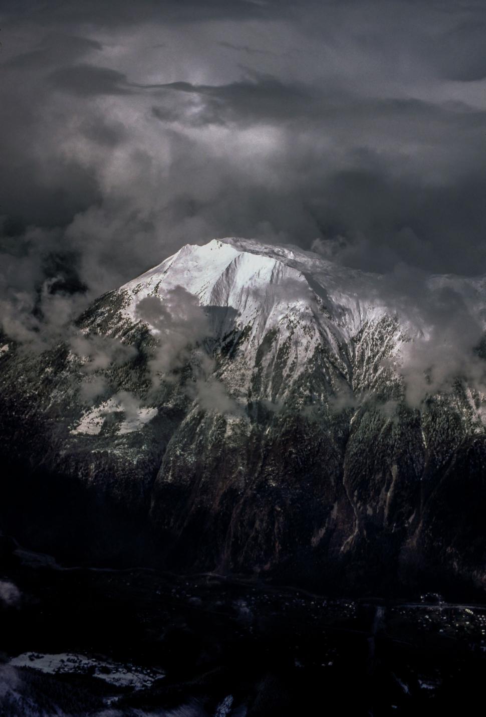 Snow Covered Mountains Under Black Cloudy Sky Wallpapers