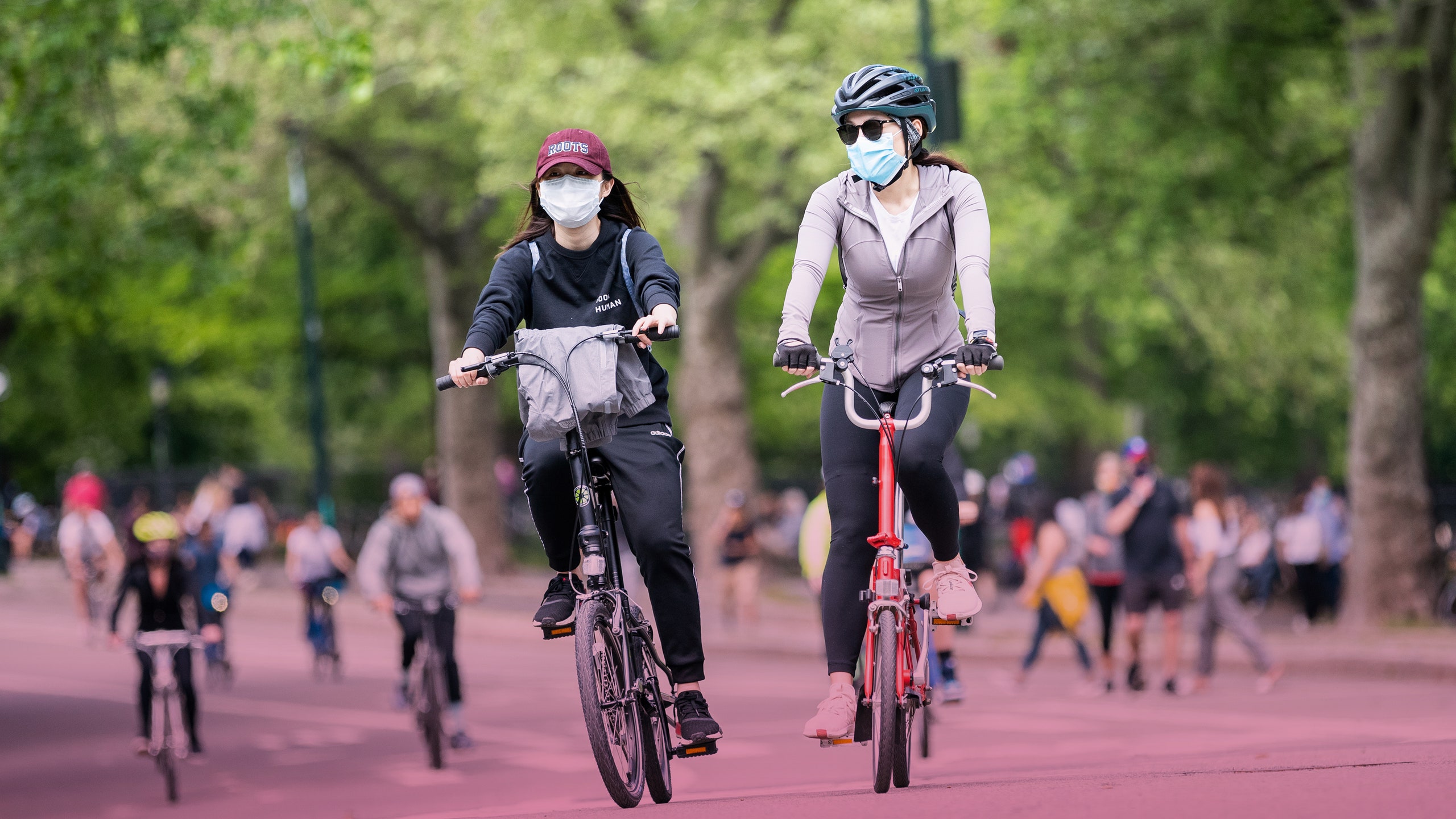 Girl Cycling Near Sea 4K Wallpapers