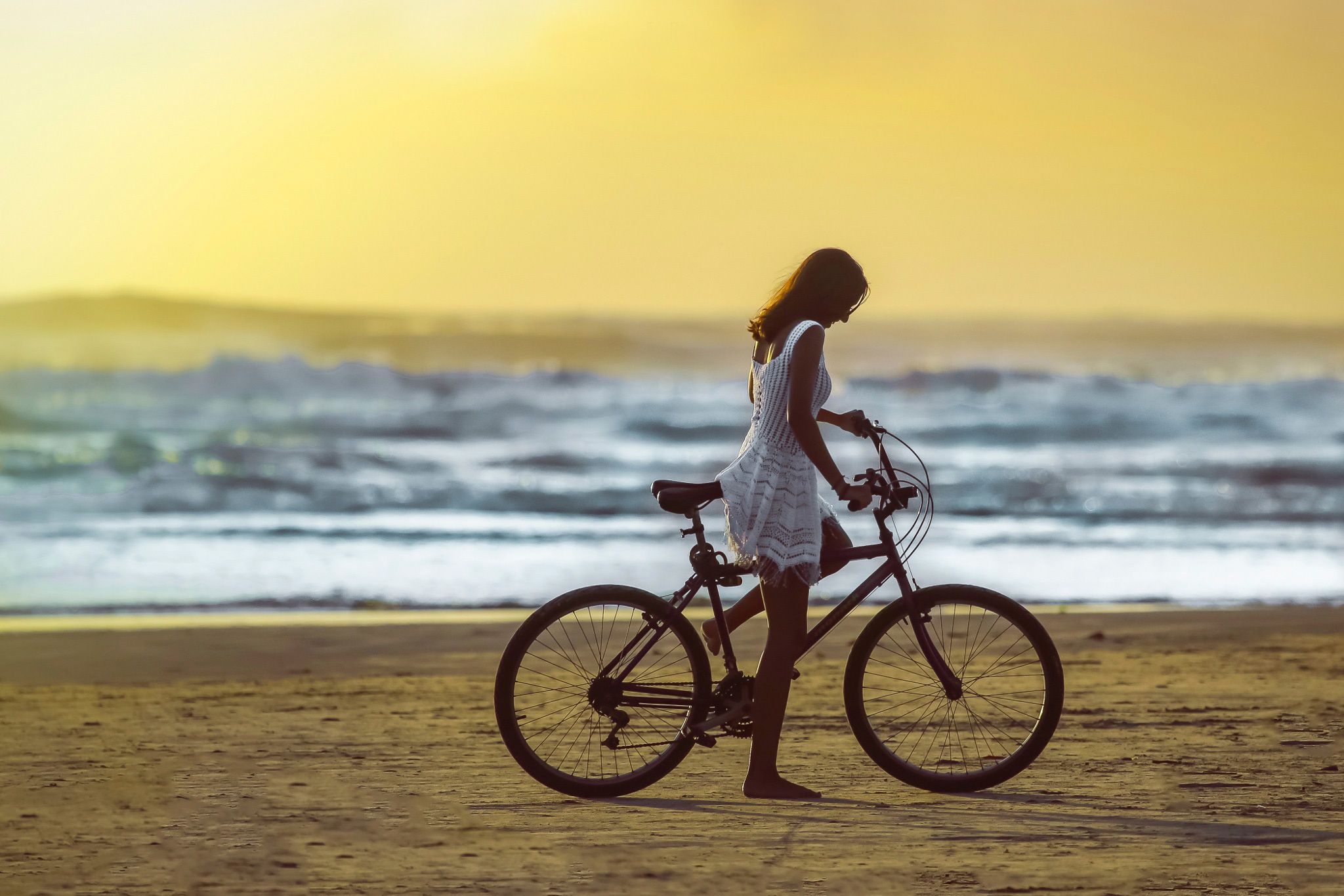 Girl Cycling Near Sea 4K Wallpapers