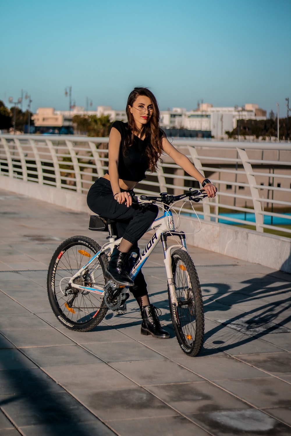 Girl Cycling Near Sea 4K Wallpapers