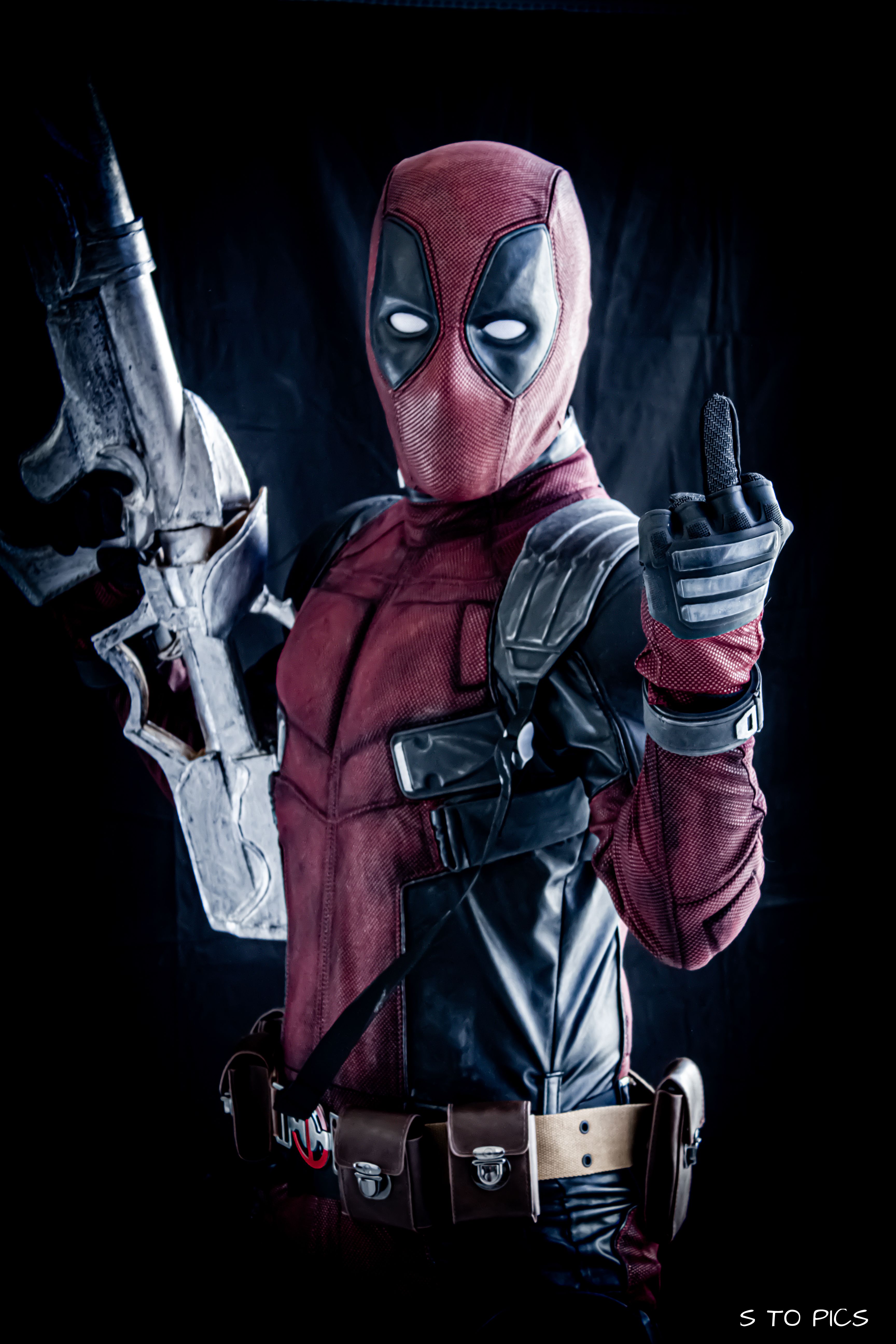 Deadpool With Guns Up Wallpapers