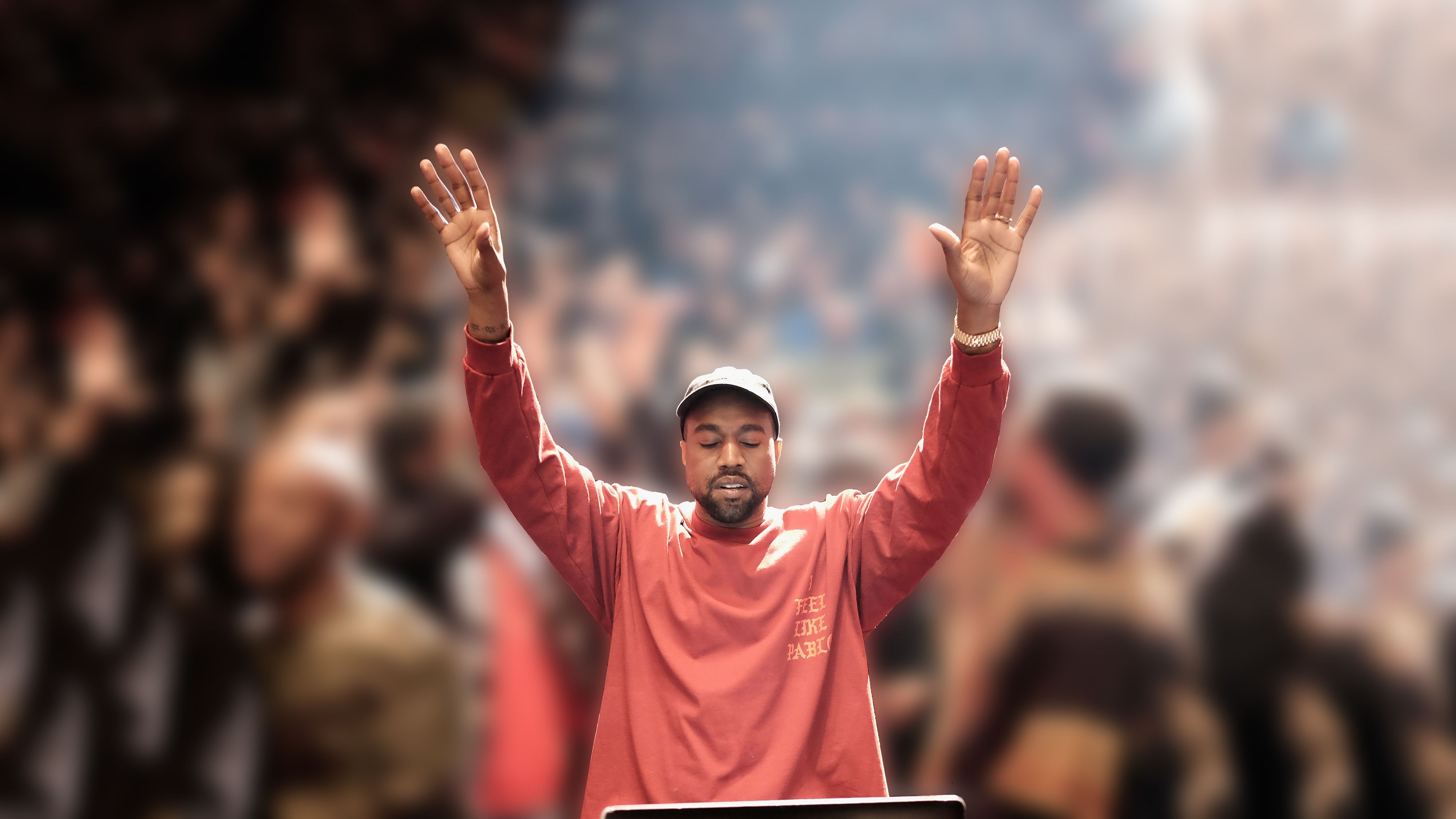 Kanye West With His Hands Up Wallpapers