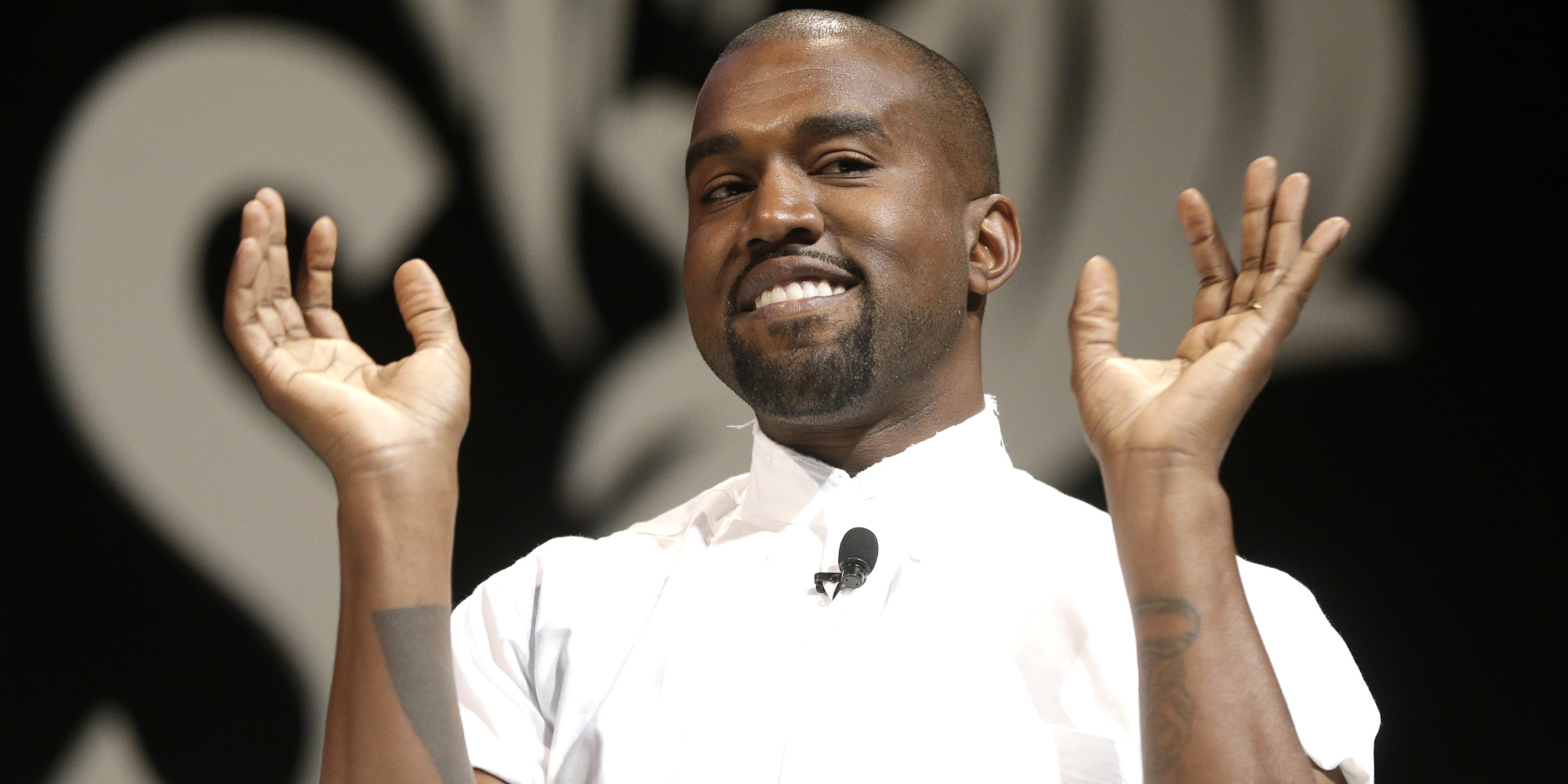 Kanye West With His Hands Up Wallpapers