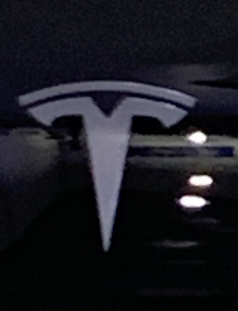 Tesla Logo Black Background